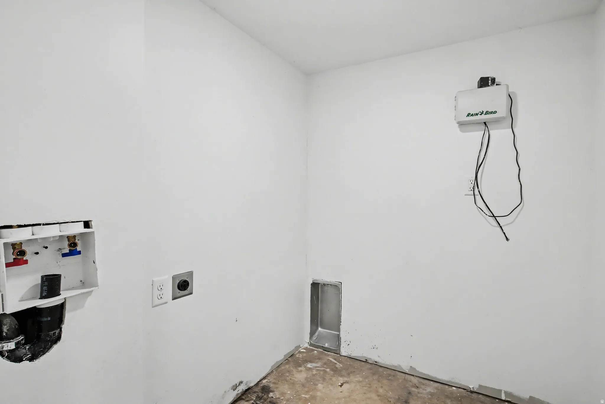 Laundry area with electric dryer hookup, unfinished concrete floors, and hookup for a washing machine