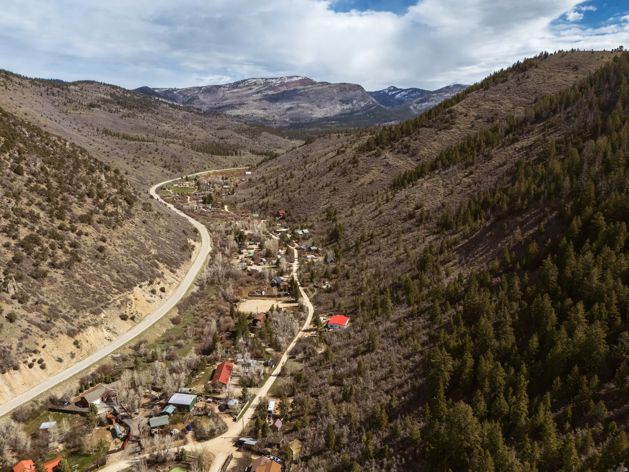 Aerial view of property, Mirror Lake highway, and canyon area