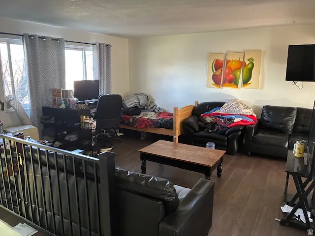 Living area featuring hardwood / wood-style floors and an office area