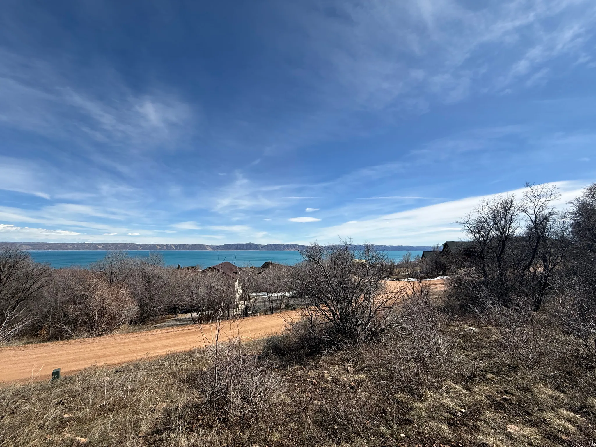 View of mountain background featuring a nearby body of water