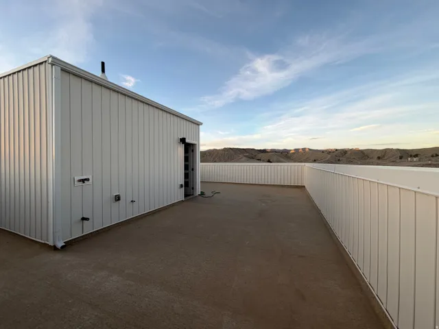 View of outbuilding featuring a patio and a mountain view