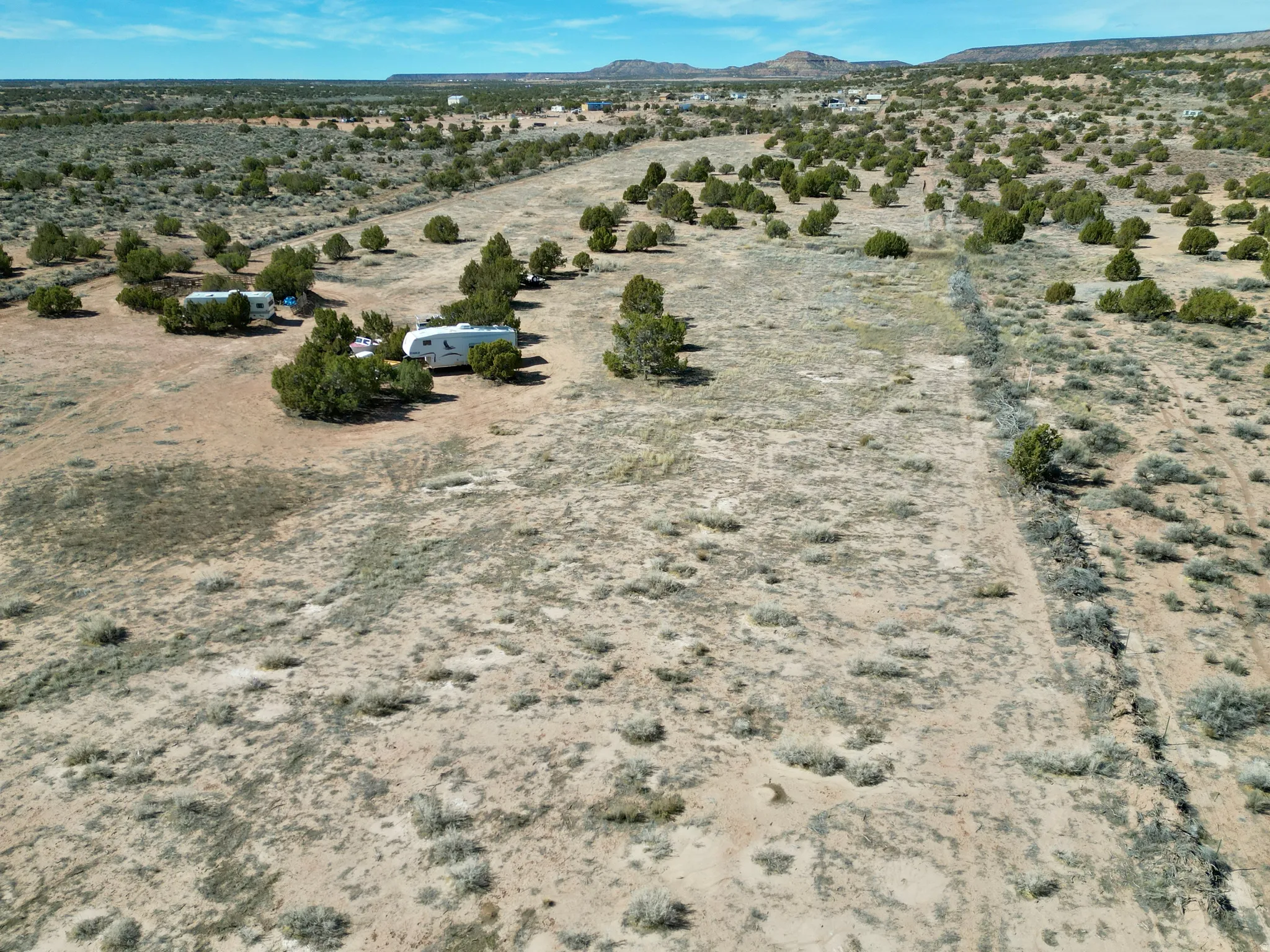 Overview of rural landscape featuring a desert landscape and mountains