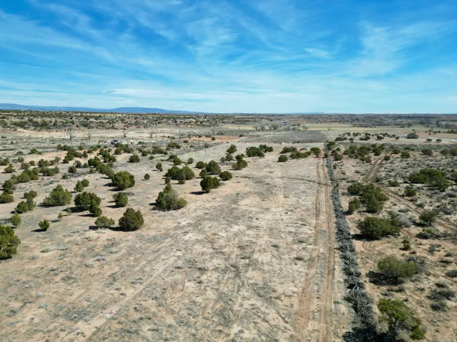View of rural area with a desert landscape and mountains