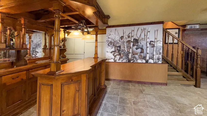 Bar with wood finish cabinetry