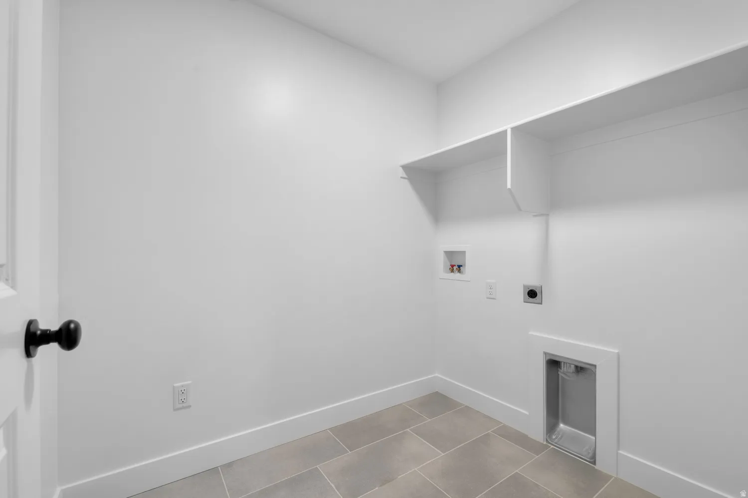 Laundry room featuring electric dryer hookup and hookup for a washing machine
