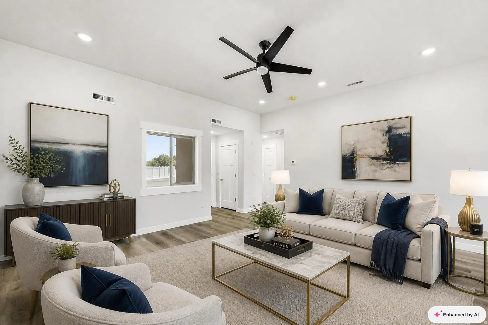 Recessed lighting, wood-finish flooring, white walls, black ceiling fan, and a double window