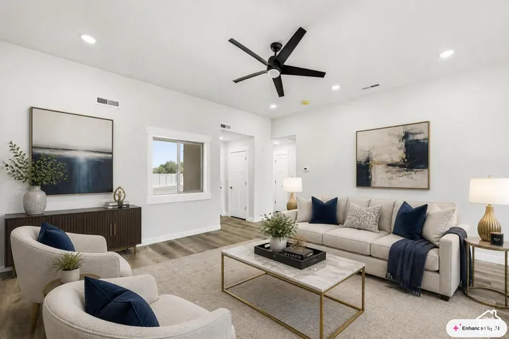 Recessed lighting, wood-finish flooring, white walls, black ceiling fan, and a double window