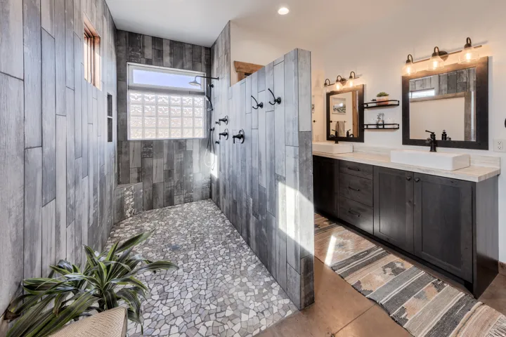 Full bathroom with vanity and a walk in shower