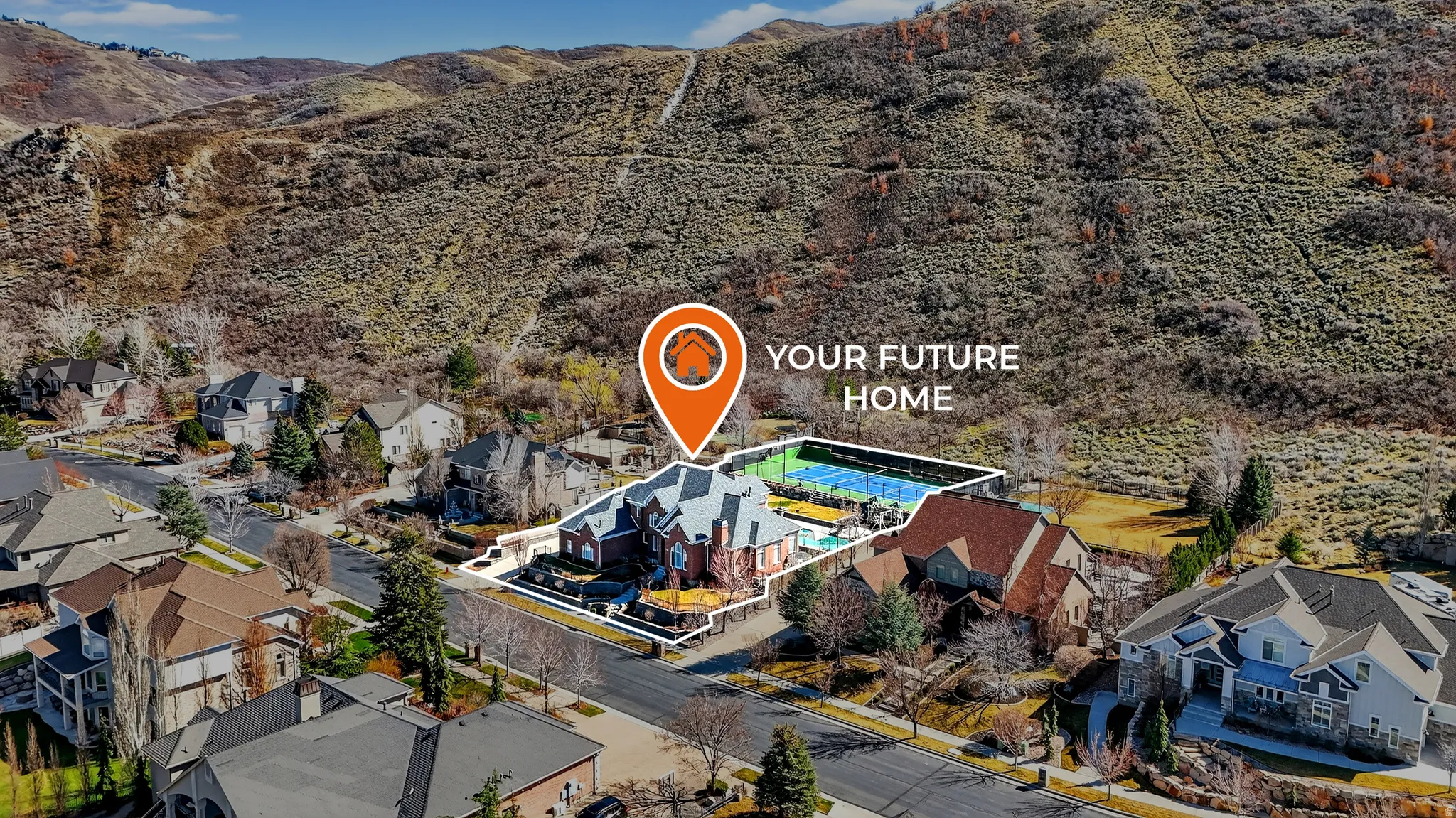 Aerial view of residential area featuring mountains