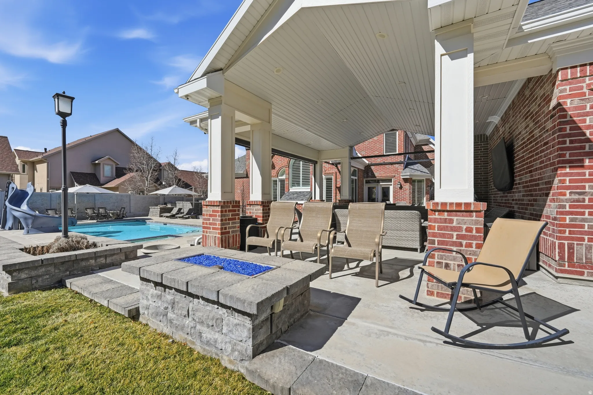 View of patio / terrace with an outdoor fire pit