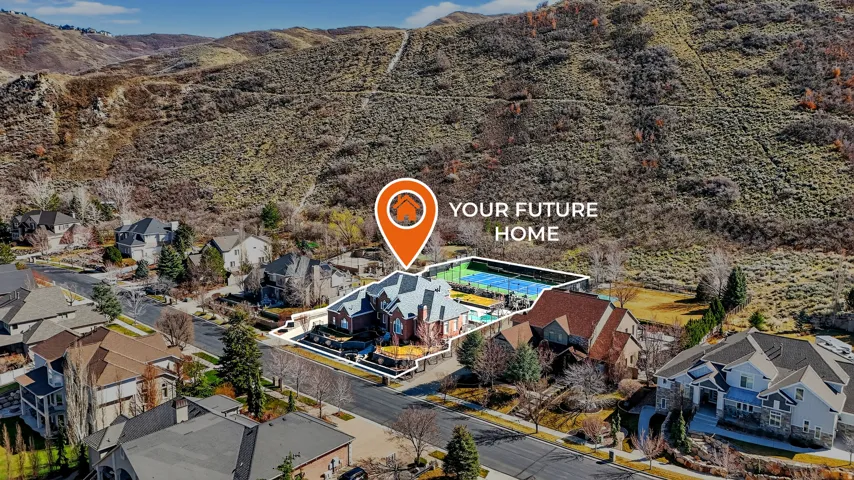 Aerial view of residential area featuring mountains