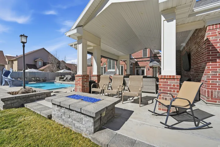 View of patio / terrace with an outdoor fire pit