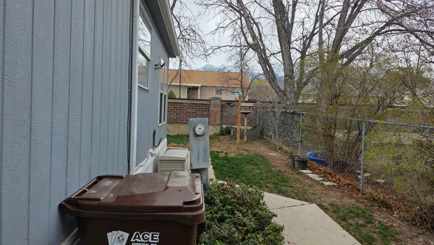 View of fenced backyard