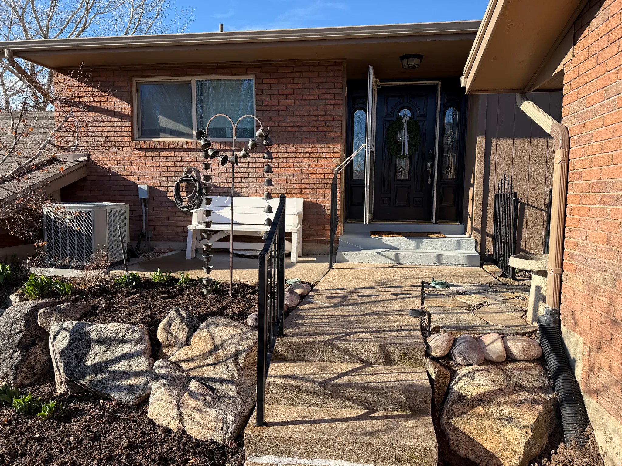 Entrance to property with brick siding