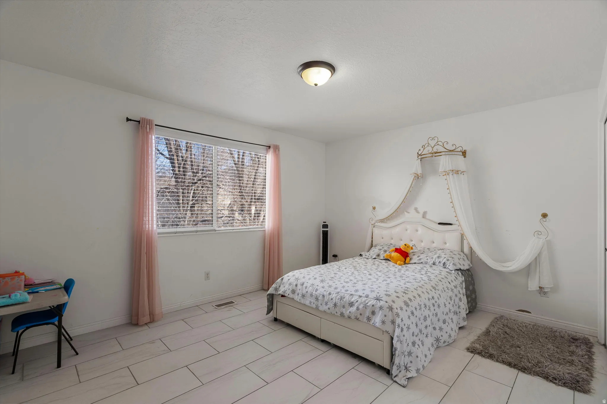 Bedroom featuring baseboards