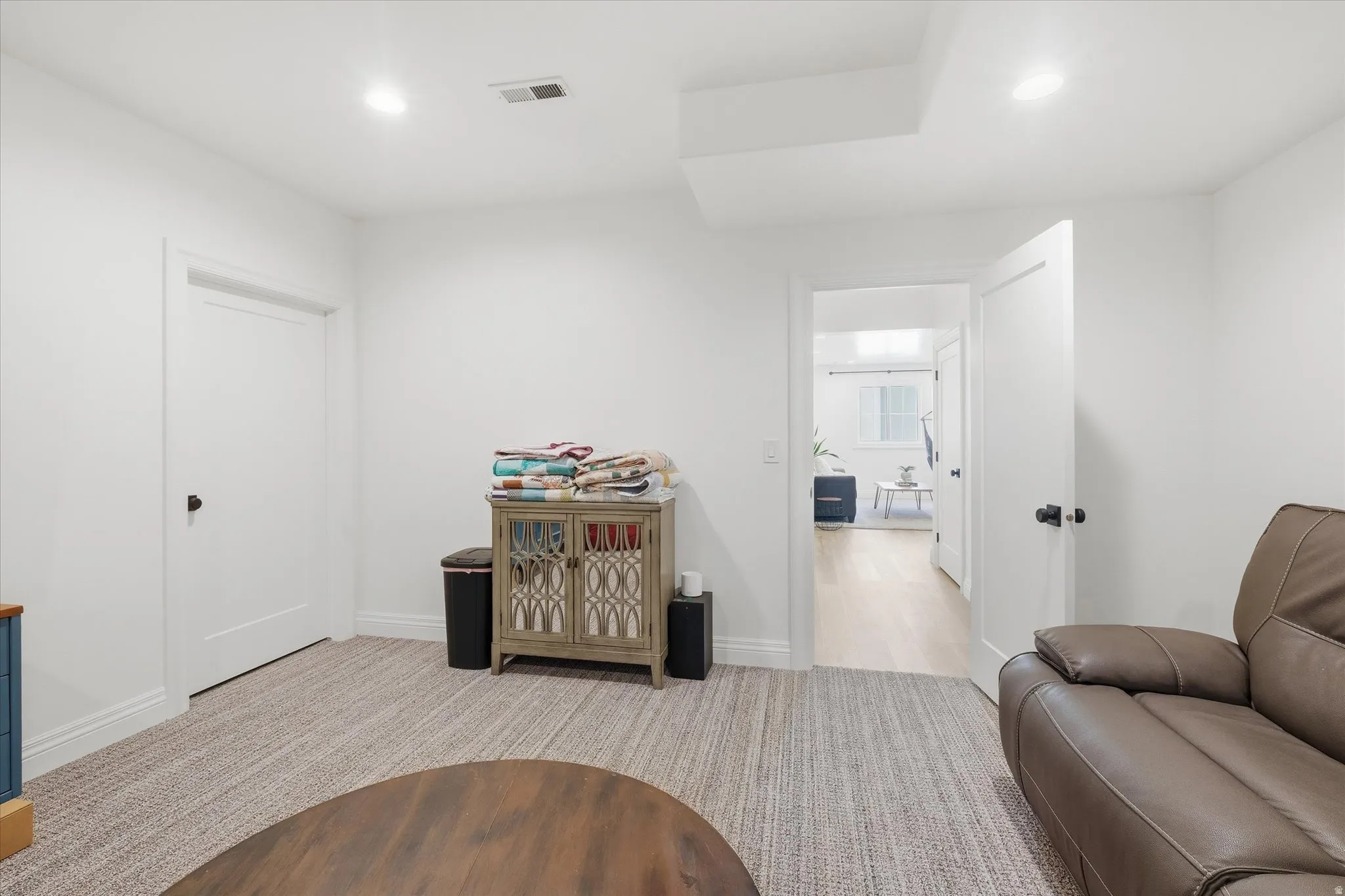 Theater room in basement next to family/great room/wet bar
