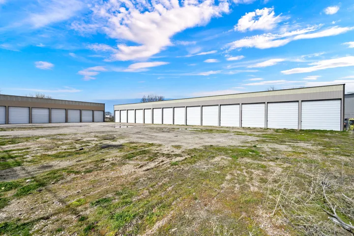 View of pole building with community garages