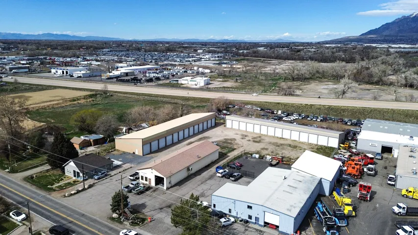 Aerial view of industrial structures and mountains