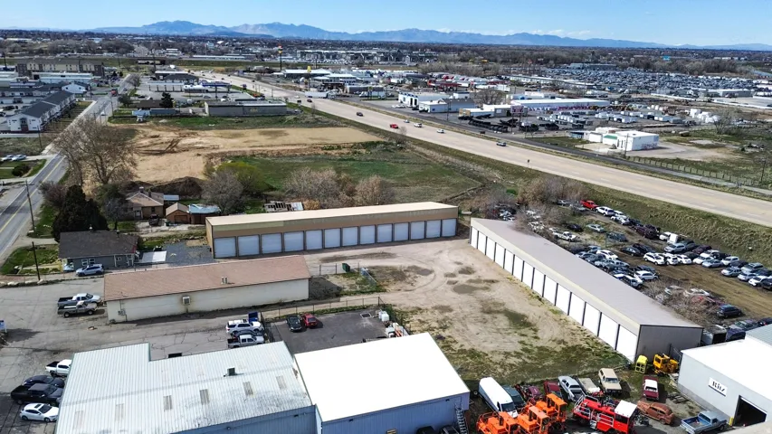 View of property location featuring an industrial area and a mountainous background