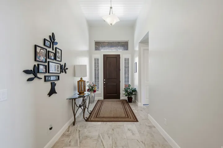 Entryway featuring baseboards