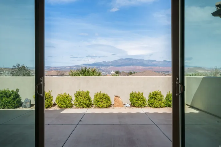 View of patio / terrace with a mountain view