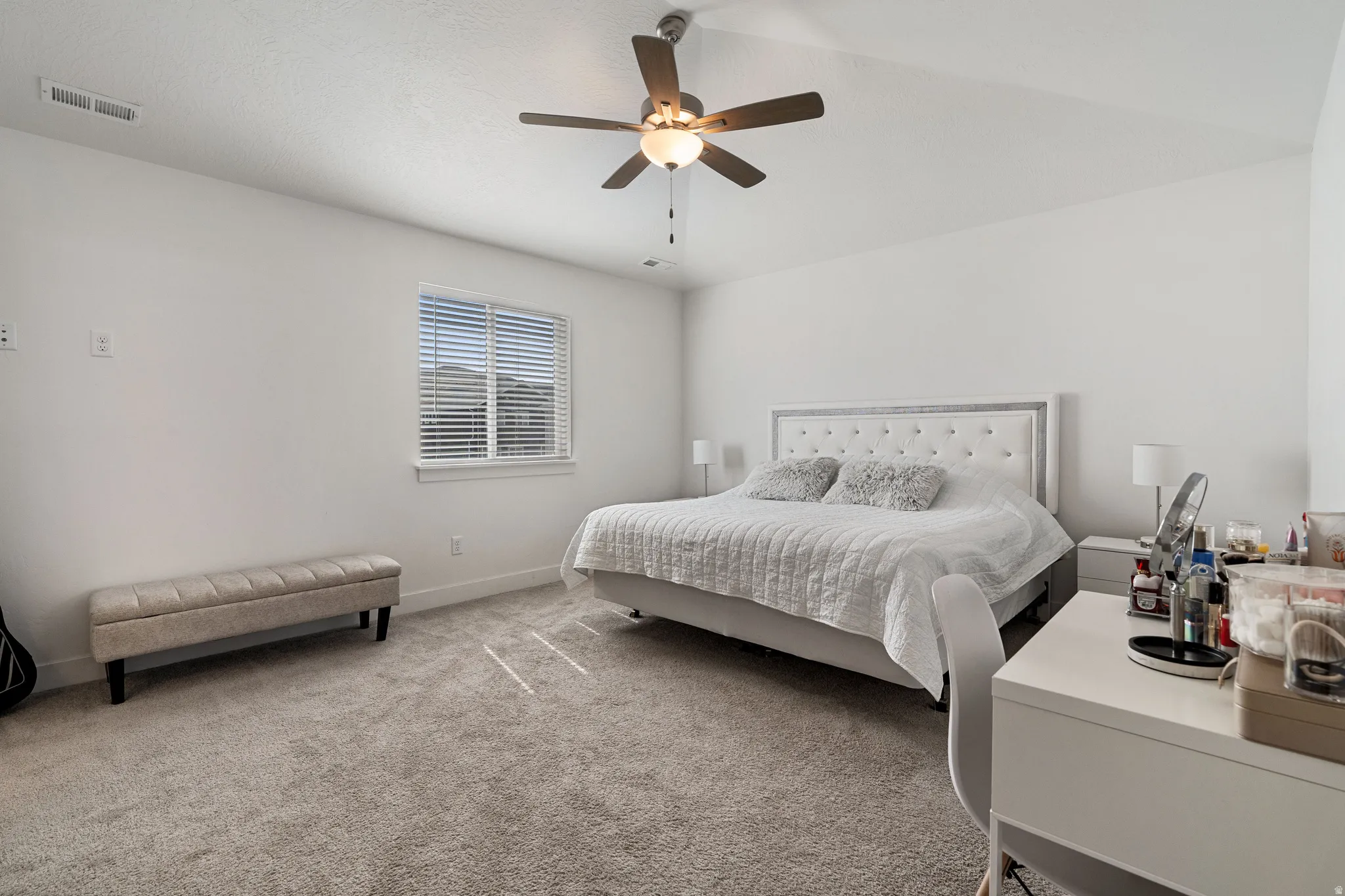Bedroom with carpet flooring and ceiling fan