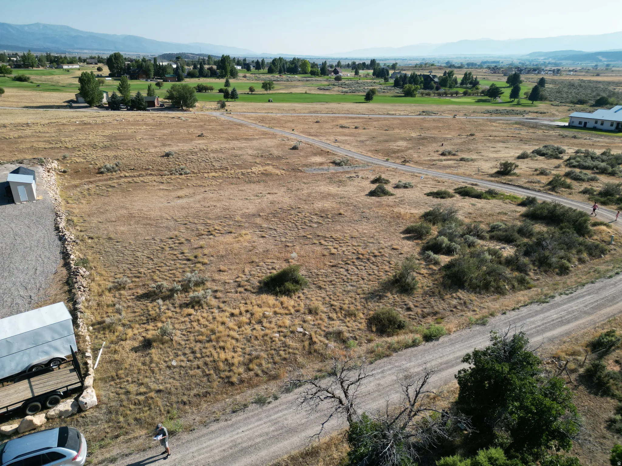 Overview of rural landscape with a mountain backdrop