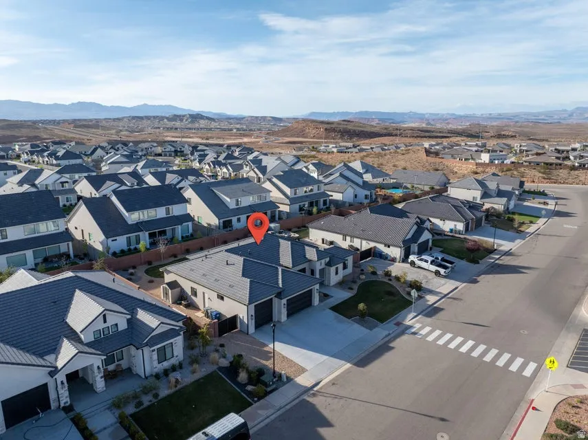 Aerial view of residential area with mountains