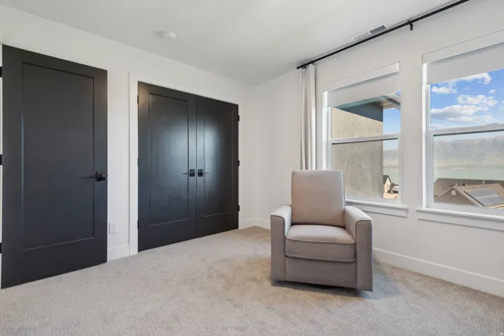 Living area with carpet floors