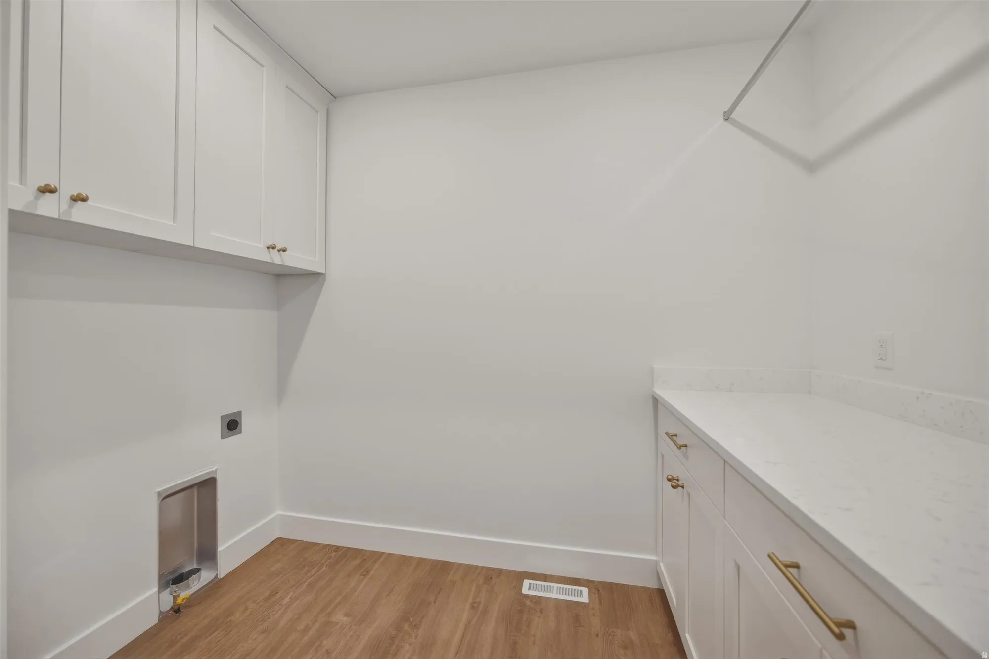 Laundry room with built-in cabinetry