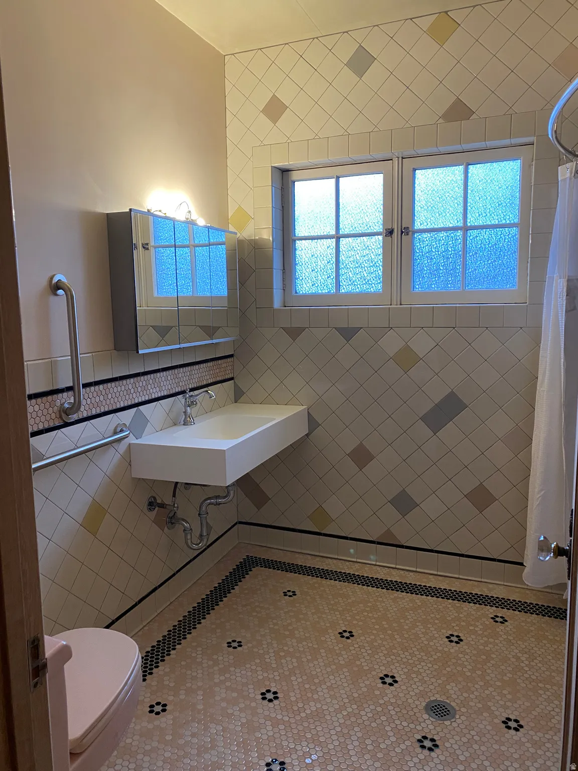 Full bath featuring tile walls and a shower with curtain