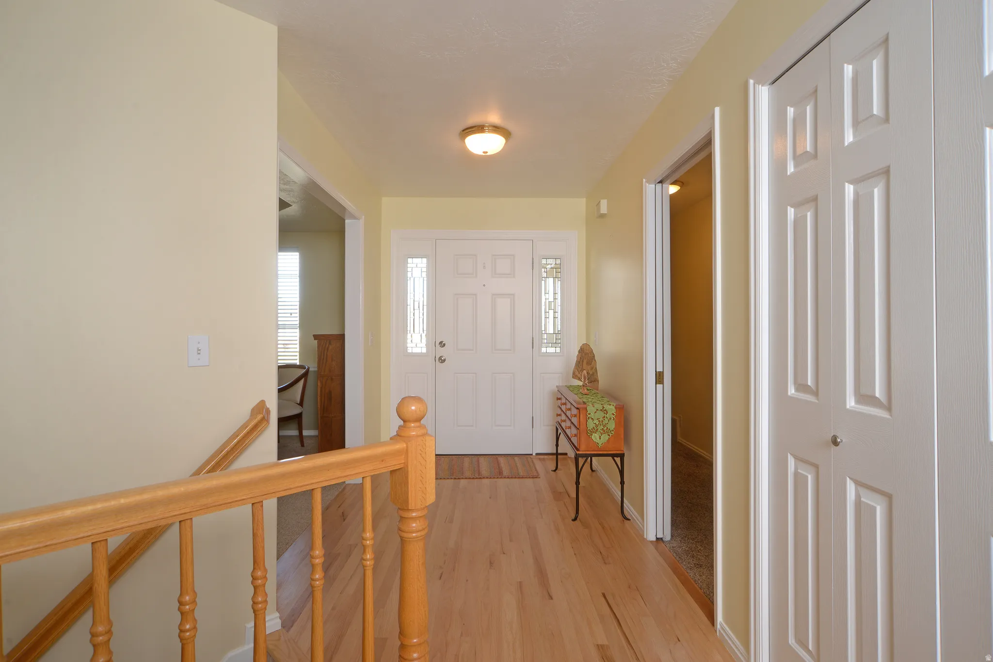 Foyer featuring light wood finished floors