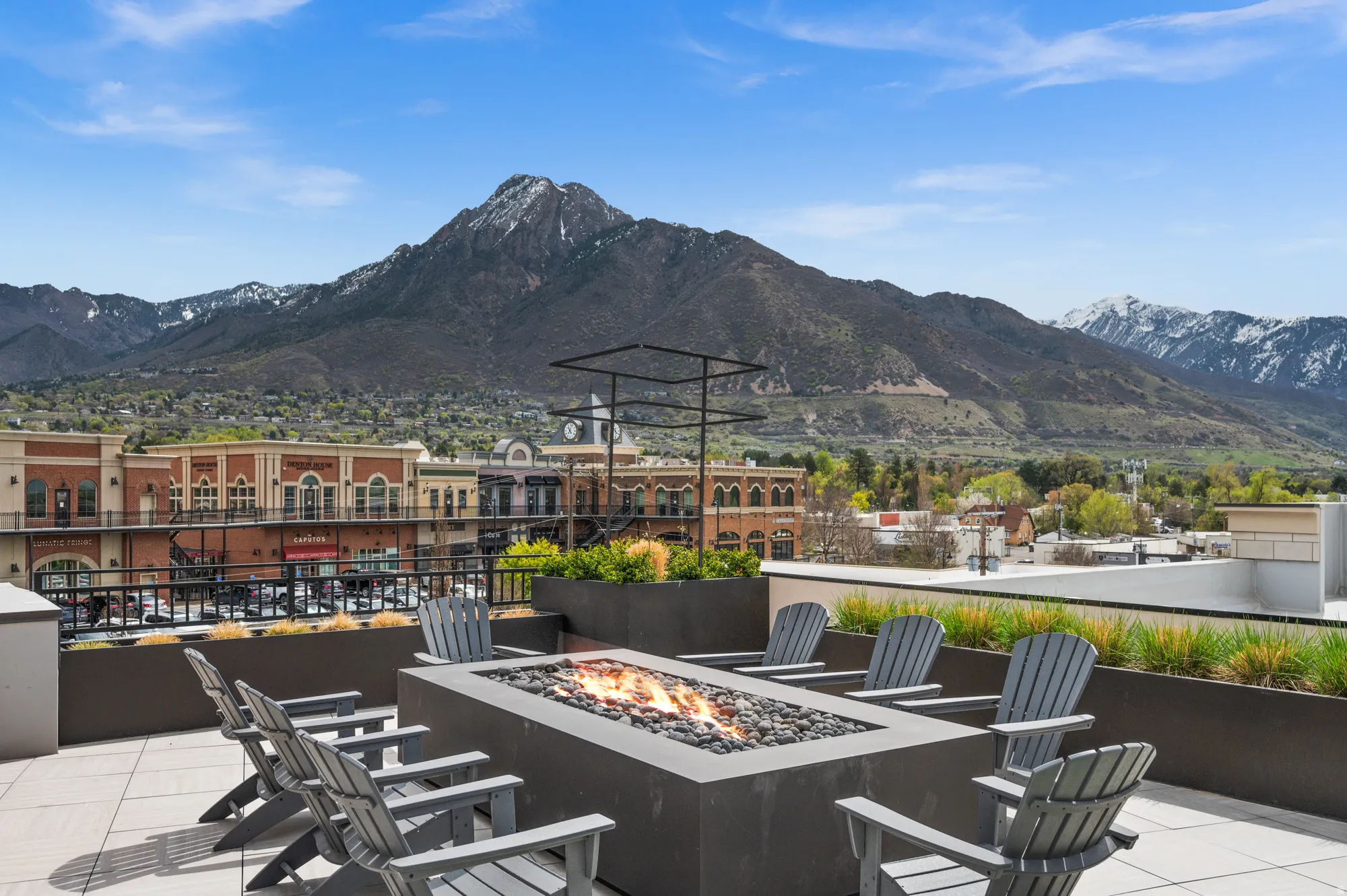 View of patio / terrace featuring a mountain view and a fire pit