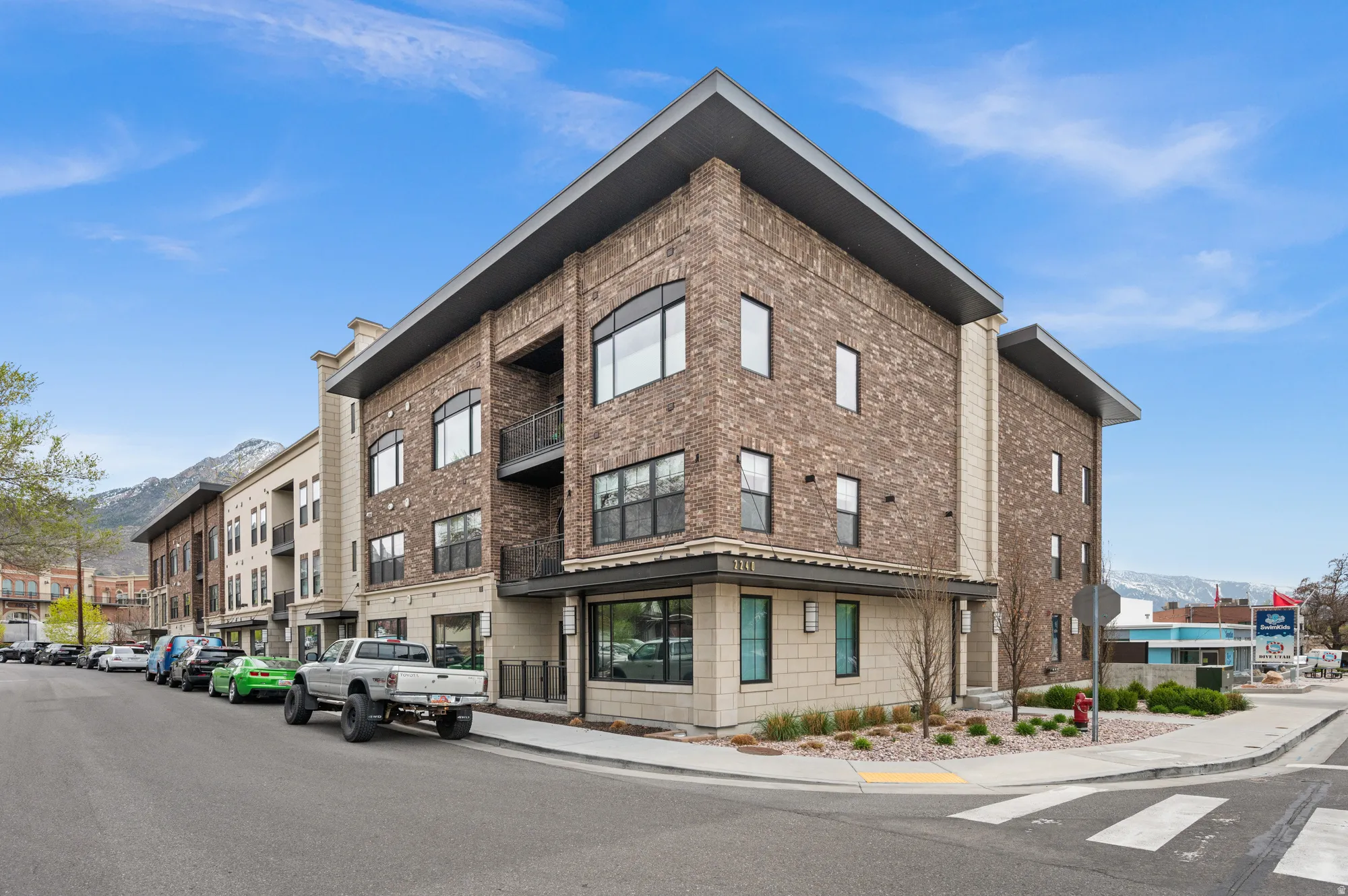 View of apartment building / complex with a mountain view
