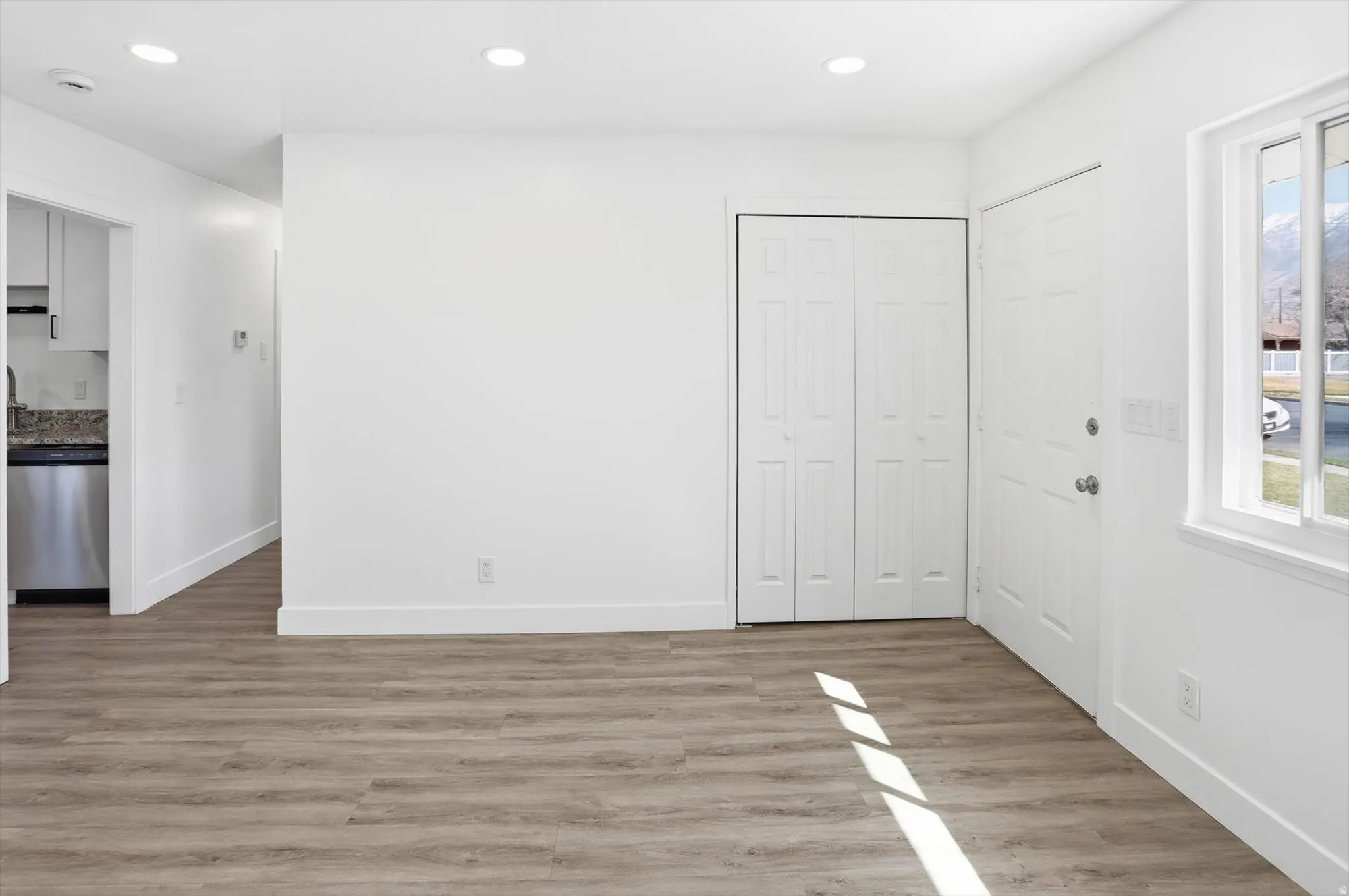 Unfurnished bedroom featuring light wood-style flooring and recessed lighting