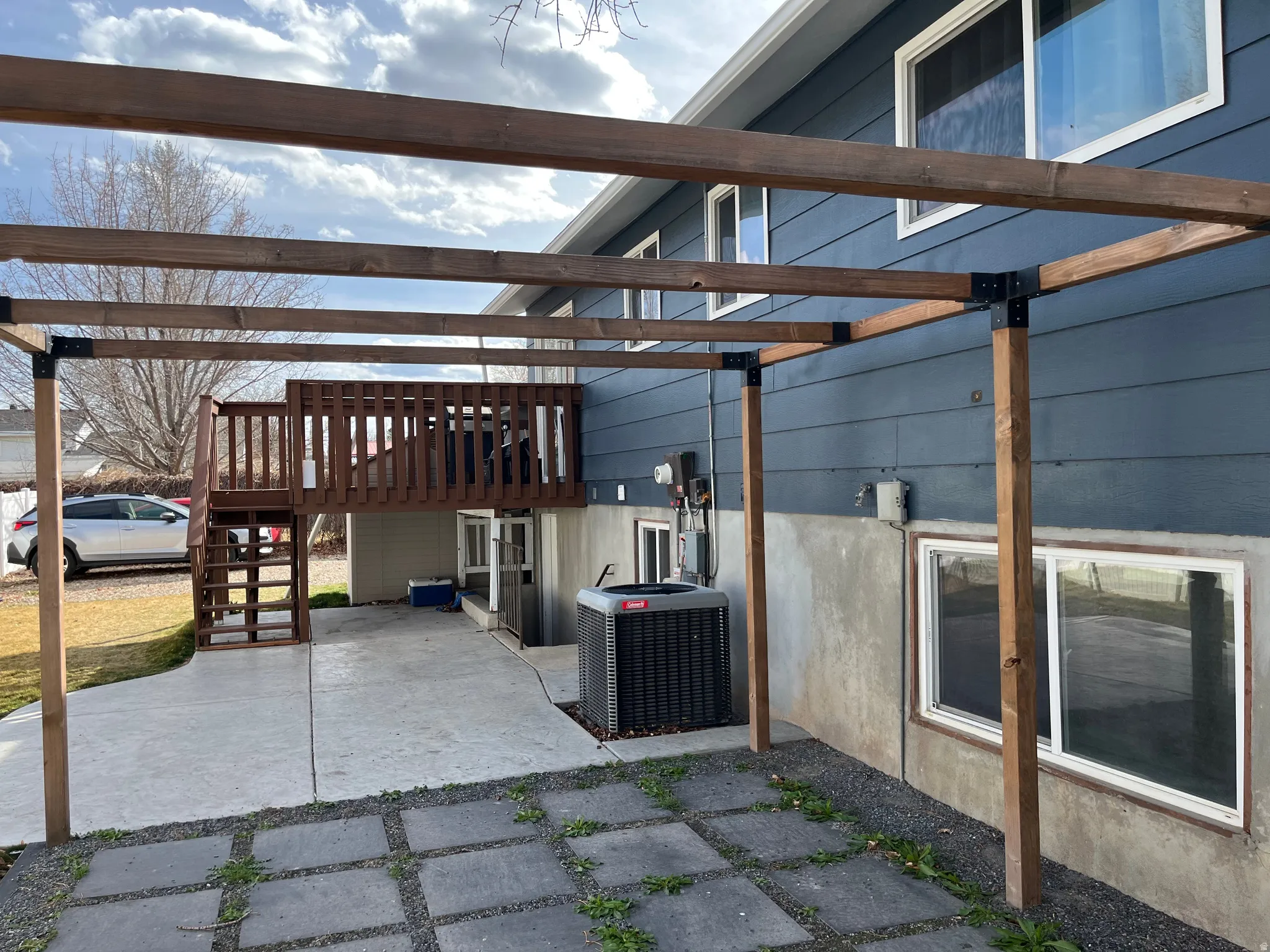 View of patio / terrace featuring stairs and a wooden deck