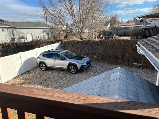 View of fenced backyard
