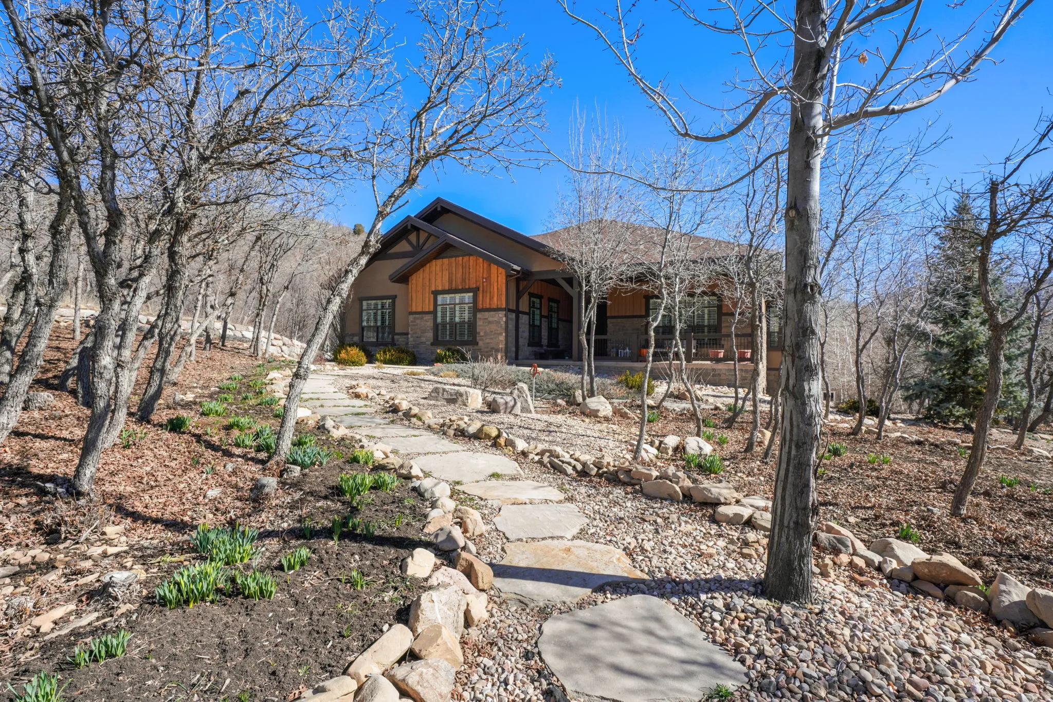 View of front facade with stone siding