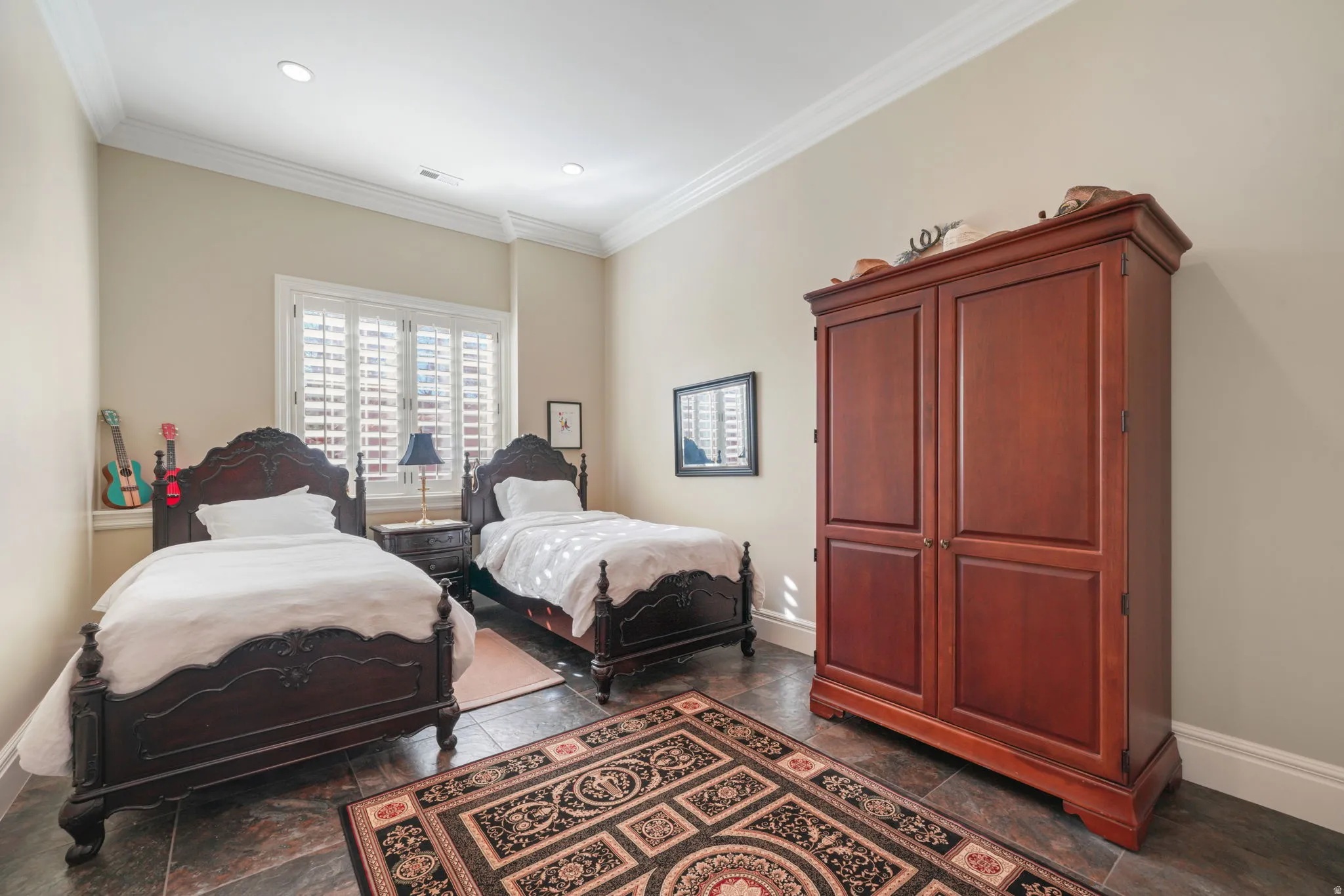 Bedroom featuring crown molding