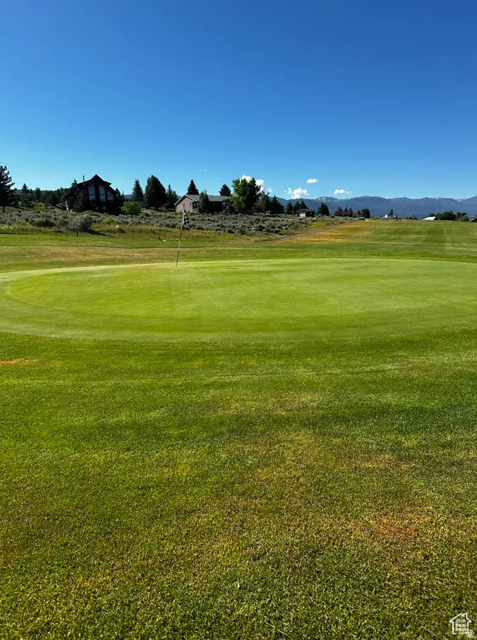 Surrounding community featuring view of golf course