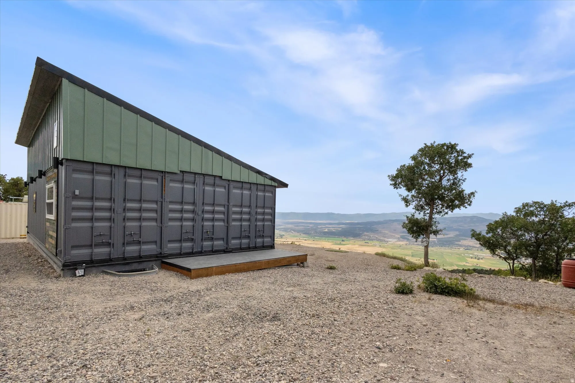 View of outbuilding featuring a mountain view