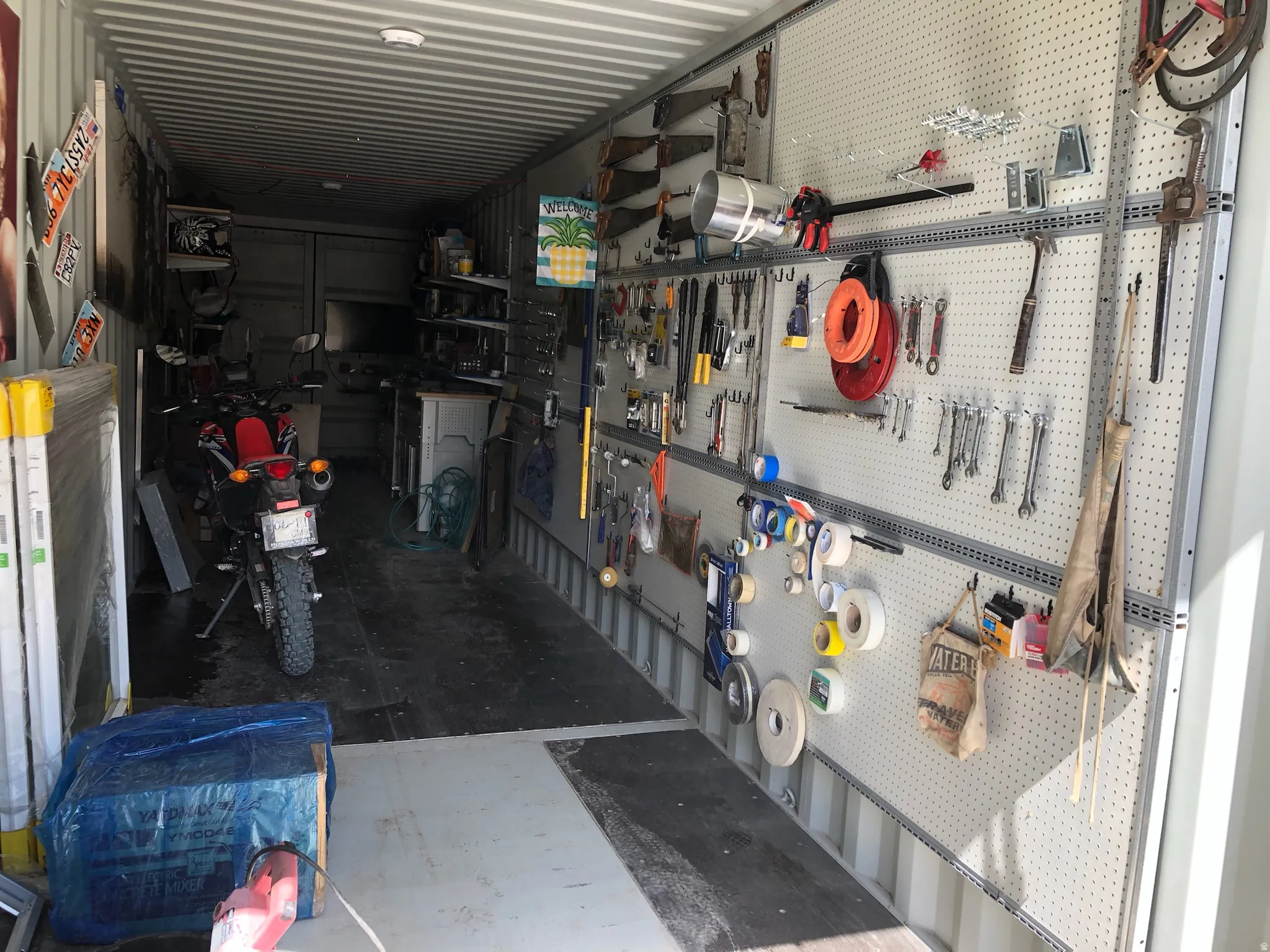 Garage featuring a workshop area