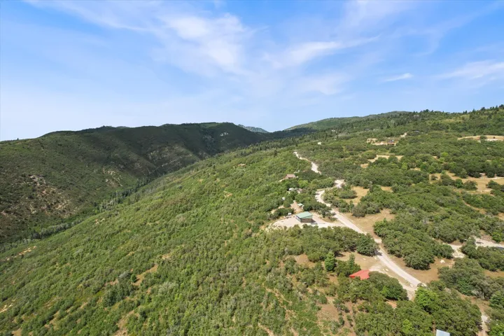 Aerial view of mountains and a heavily wooded area