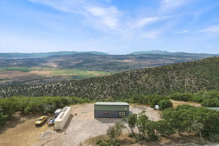 View of rural area featuring a mountain backdrop