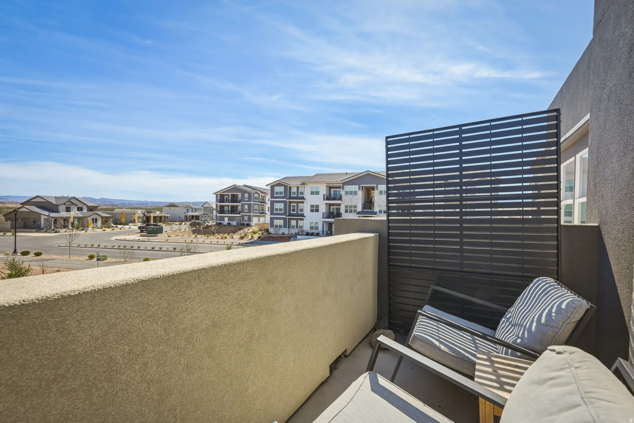 Balcony featuring a residential view