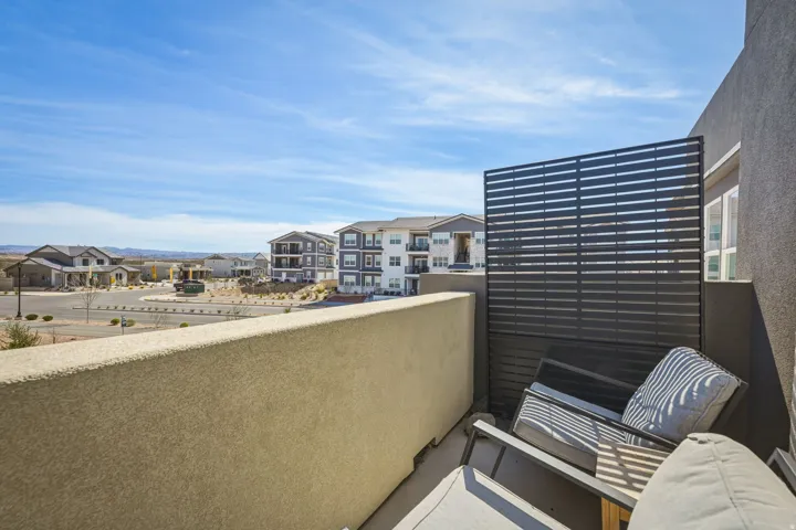 Balcony featuring a residential view