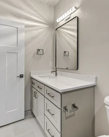 Bathroom featuring vanity and light tile patterned floors