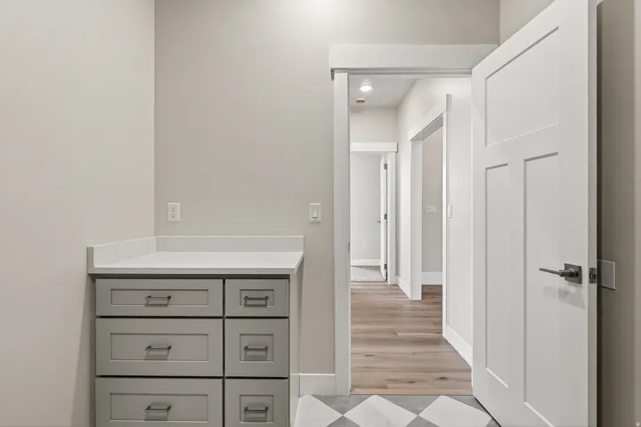 Bathroom featuring vanity and light wood-type flooring