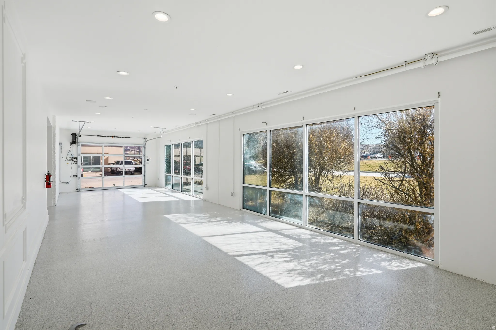 Unfurnished living room with recessed lighting