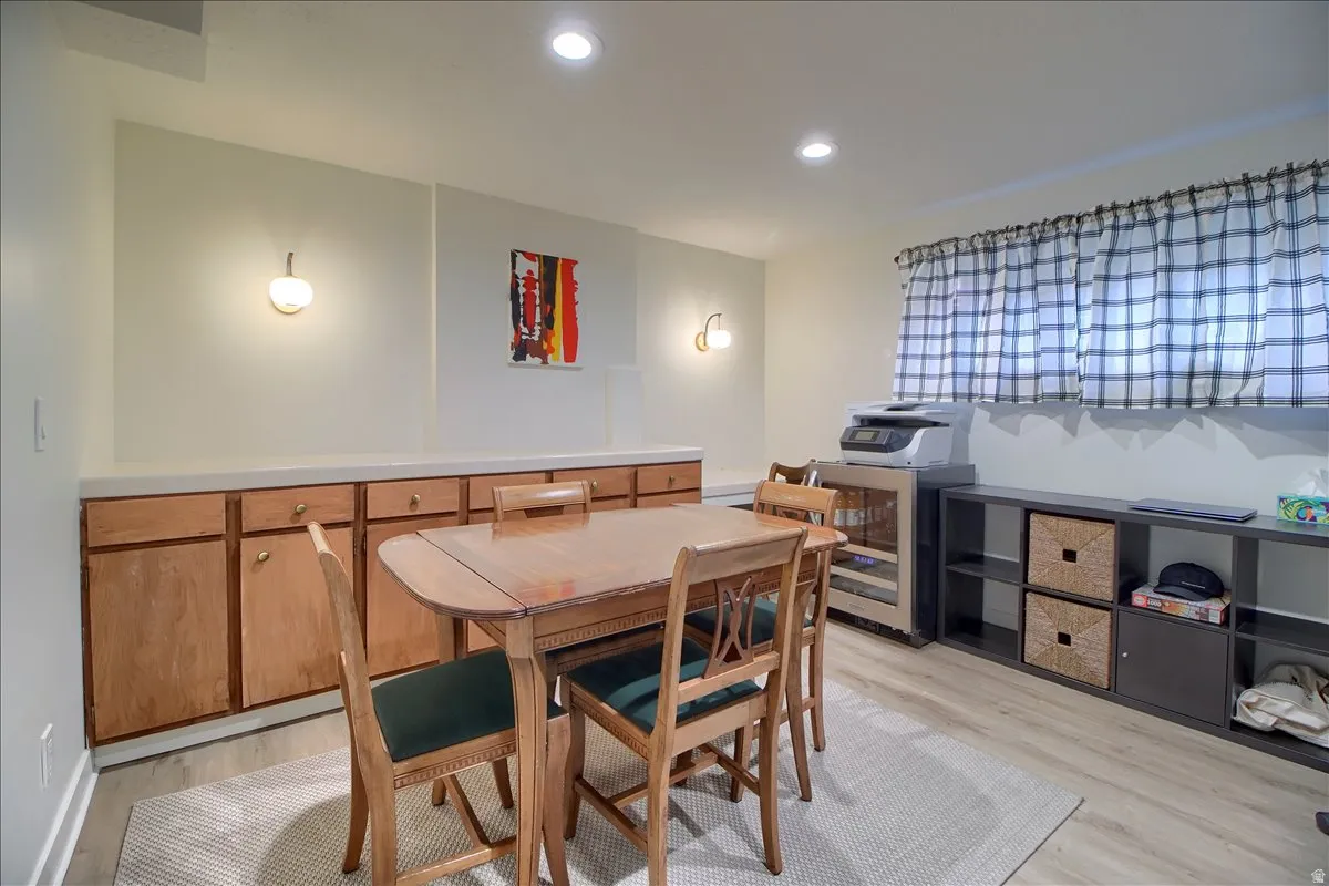 currently used as an office/game room w/recessed lighting, and a beverage cooler